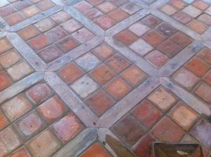 Installed Inglenook brick tile floor before sealing